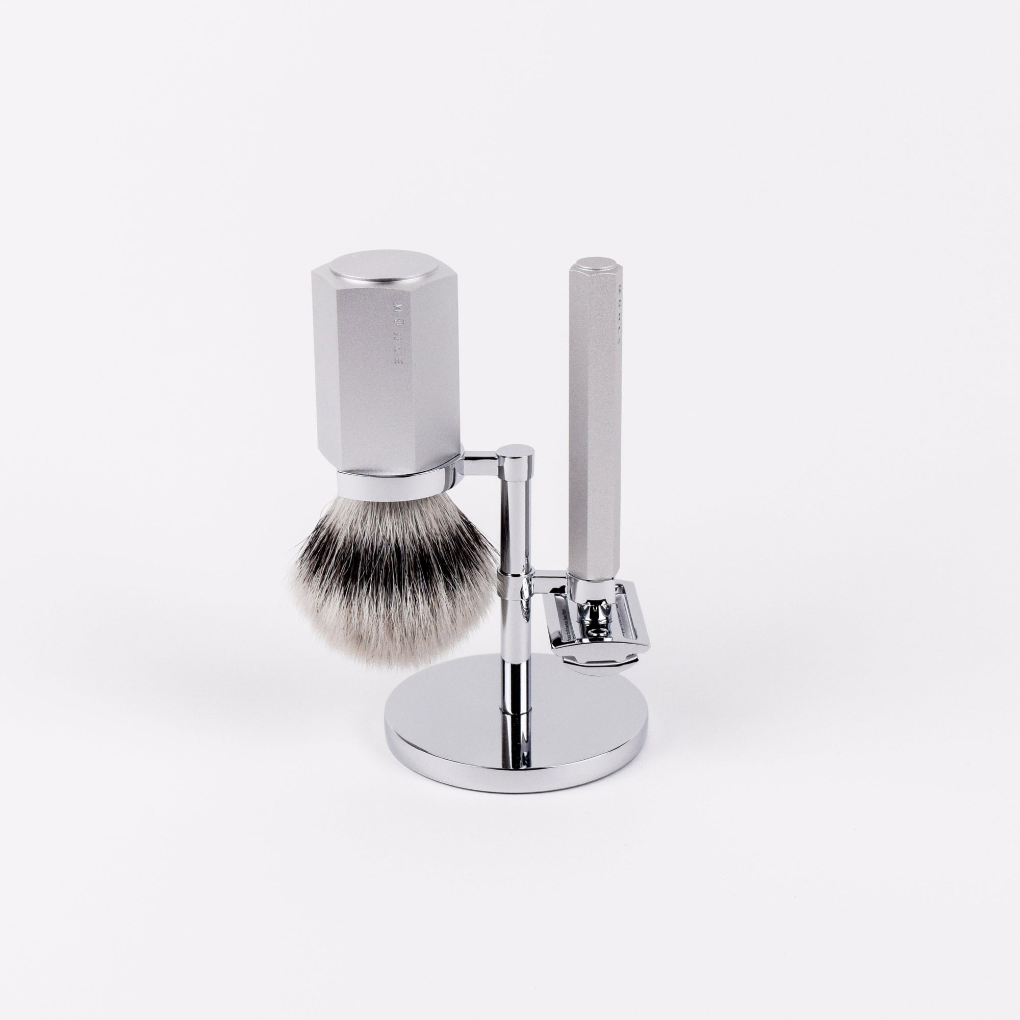 Shaving brush and stand on a white background