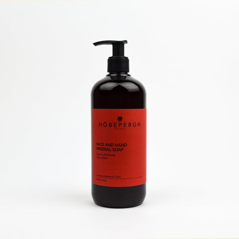 Bottle of Hobepergh face and hand mineral soap on a white background