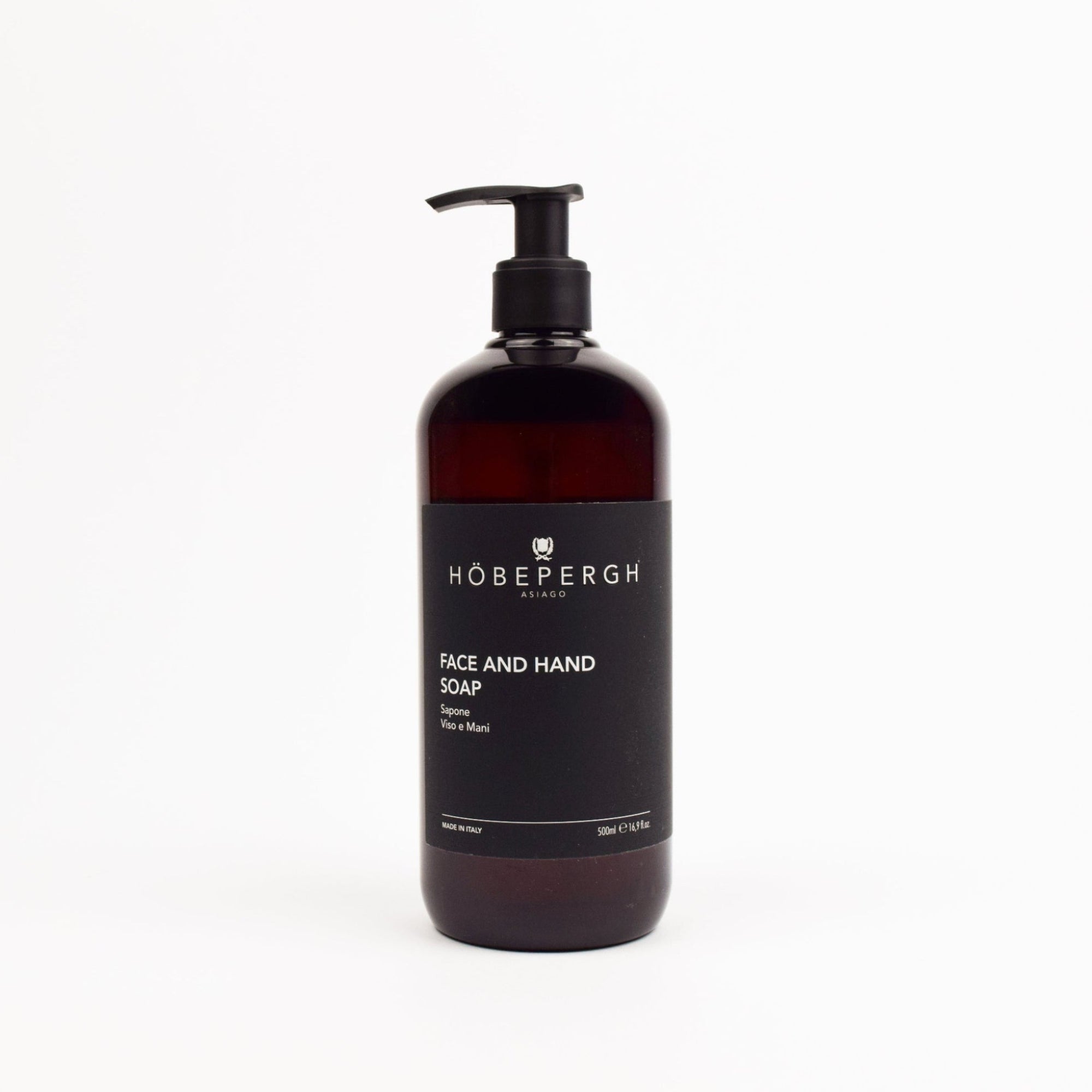 Brown soap bottle with black pump and 'Hobepergh' label on a white background