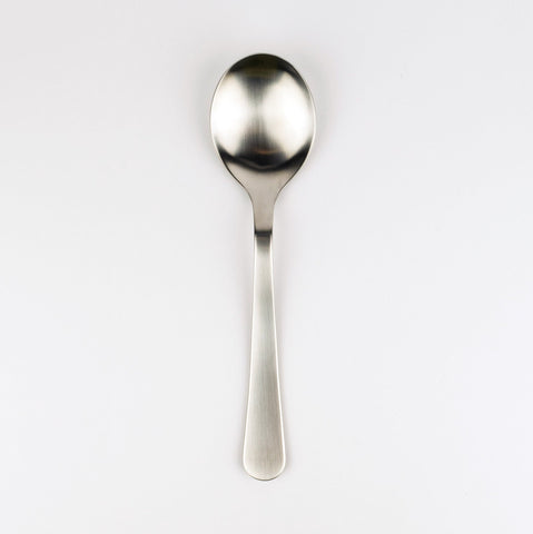 Silver spoon on a white background