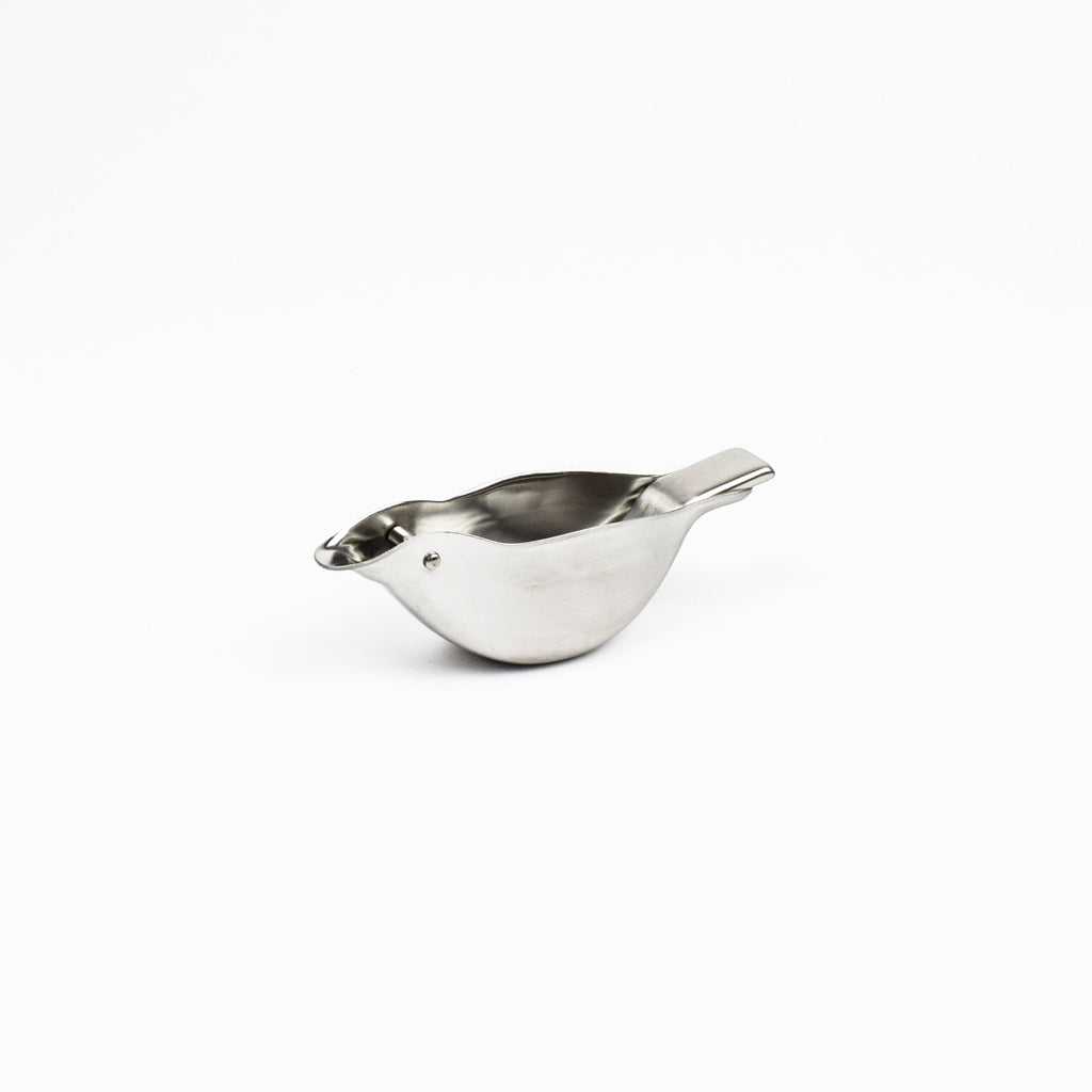 Bird shaped lemon squeezer on a white background