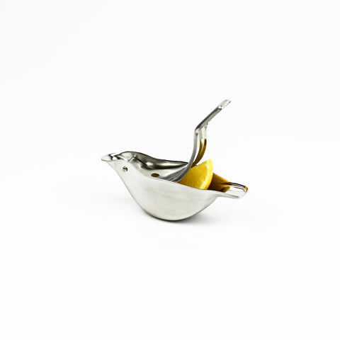 Bird shaped lemon squeezer on a white background
