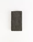 Dark gray textured fabric on a white background
