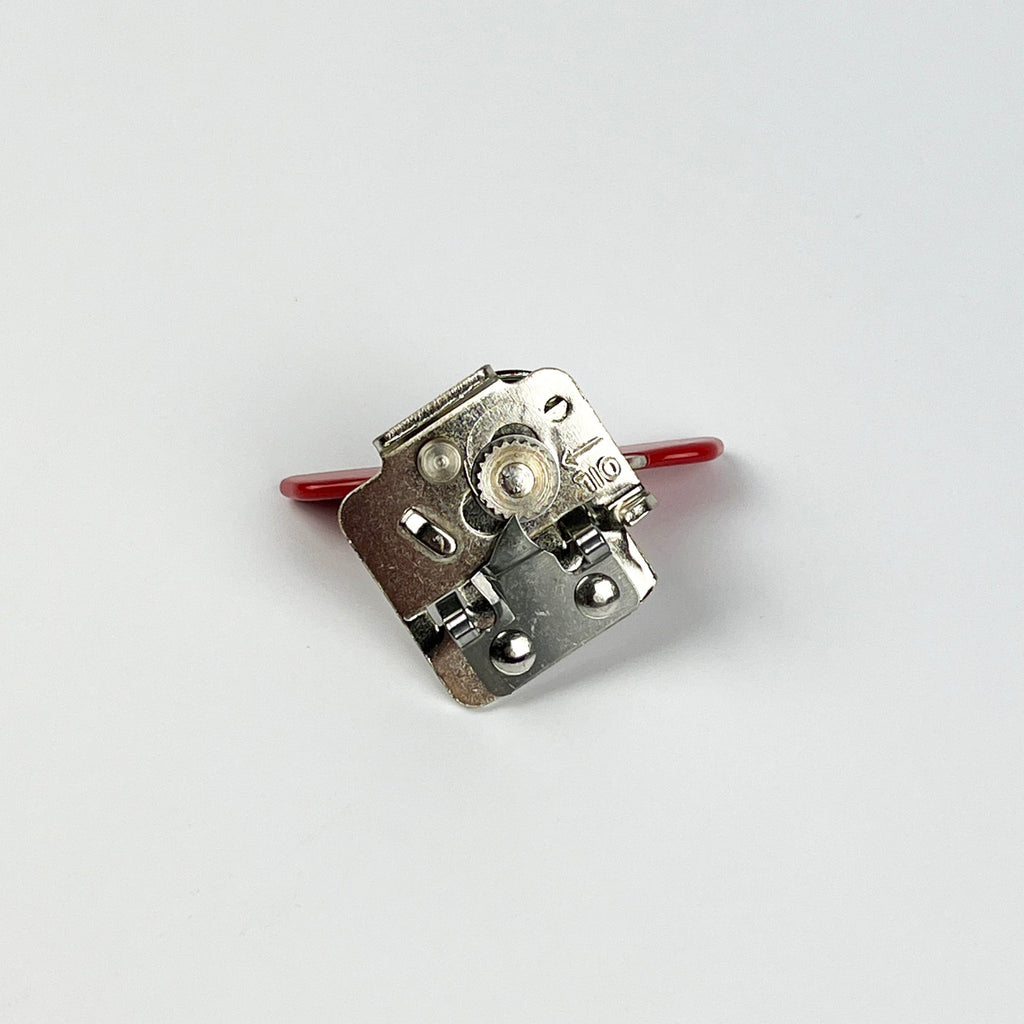 Metal can opener  on a white background