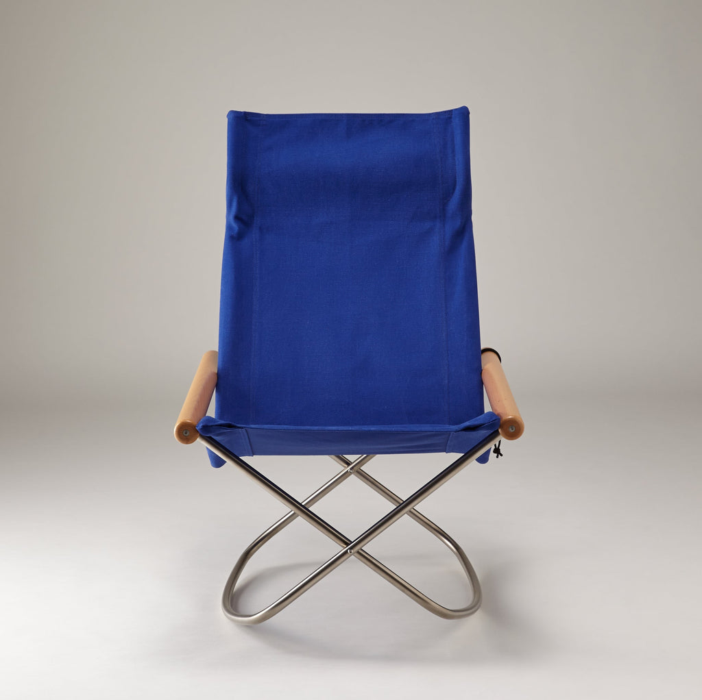 Blue folding chair with wooden armrests on a gray background