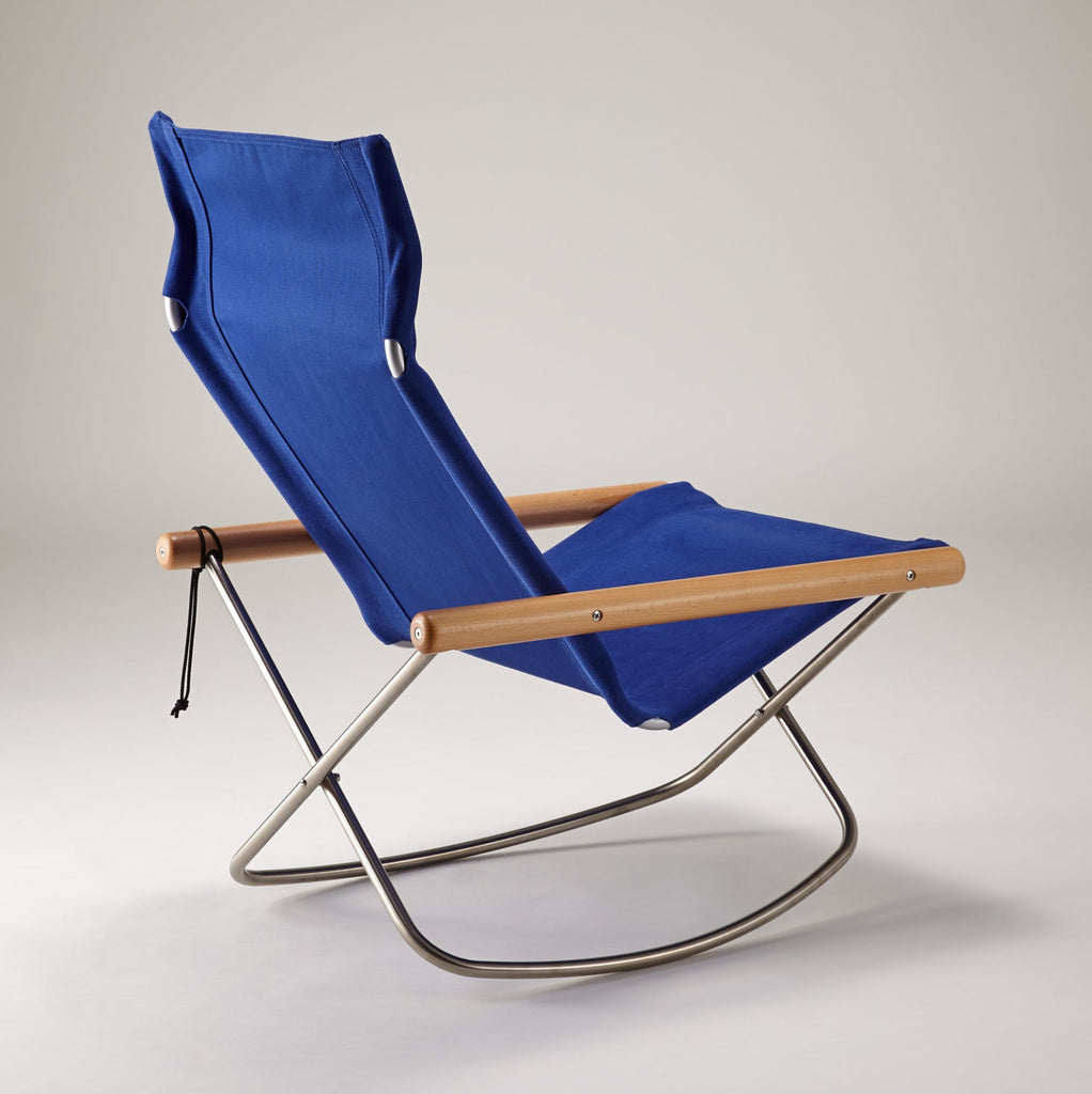 Blue folding chair with wooden armrests on a gray background