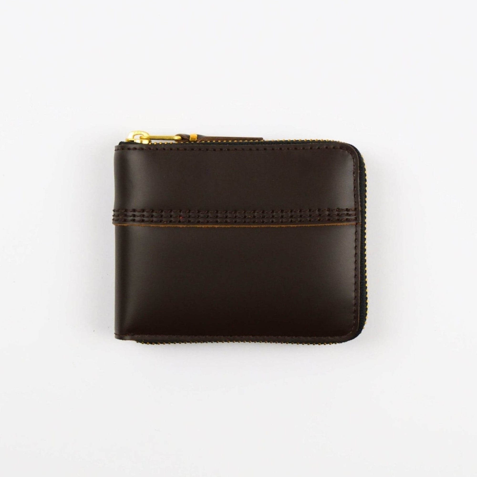Brown leather wallet with gold zipper on a white background