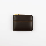 Brown leather wallet with gold zipper on a white background