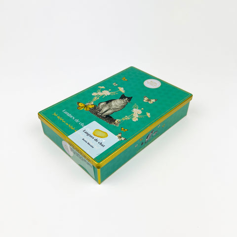 Green shortbread tin with a cat illustration on a white background