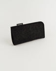 Black eyeglass case with 'PARKHAUS' label on a light gray background