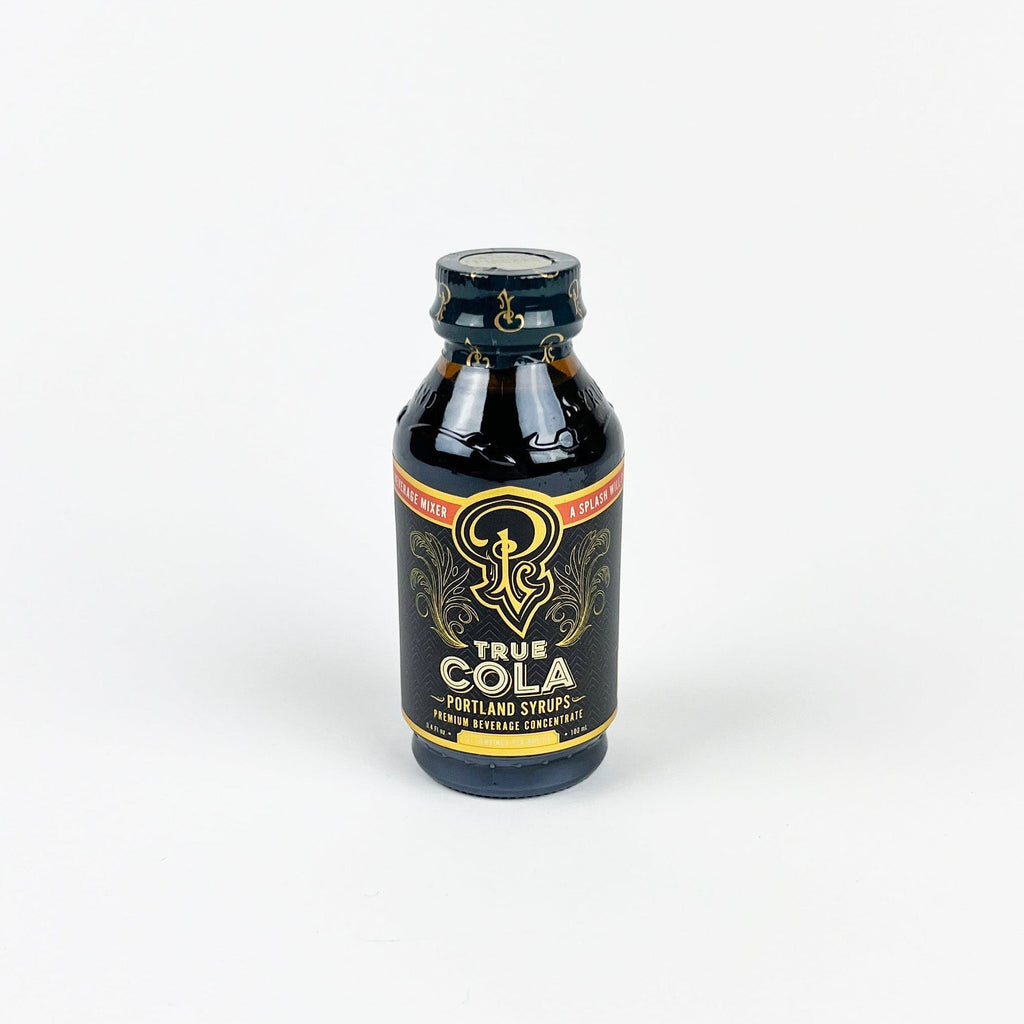 Bottle of Cola syrup on a white background