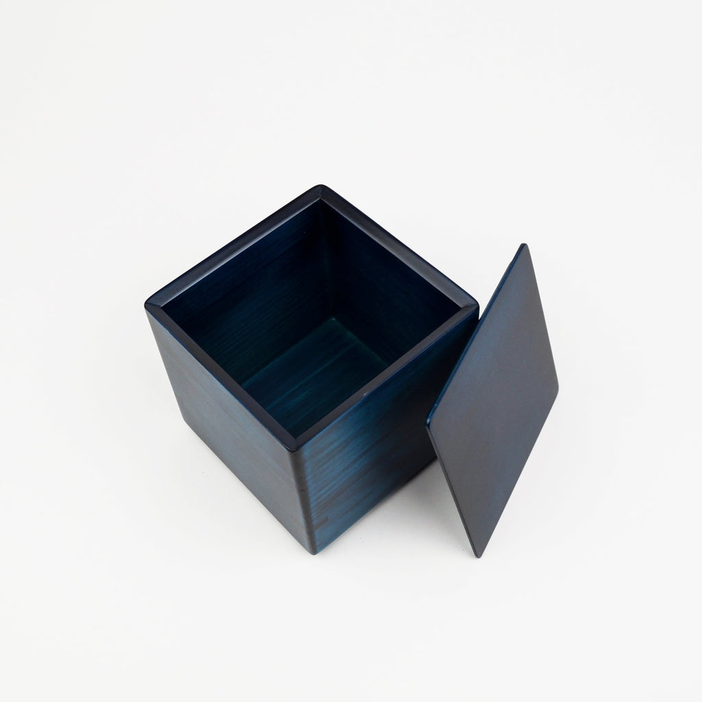 Blue square box with a lid on a white background
