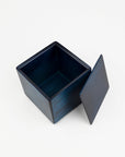 Blue square box with a lid on a white background