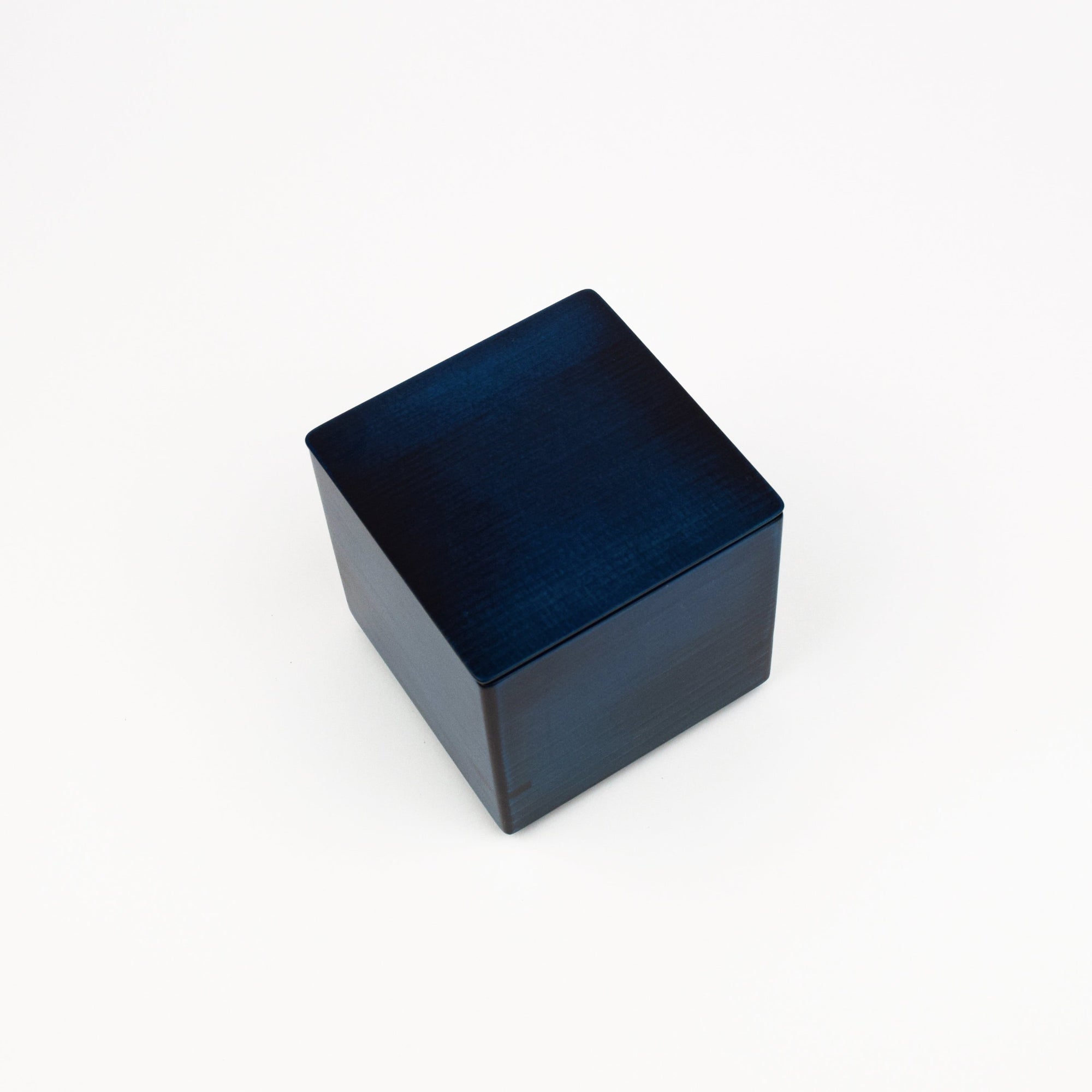 Blue square box with a lid on a white background