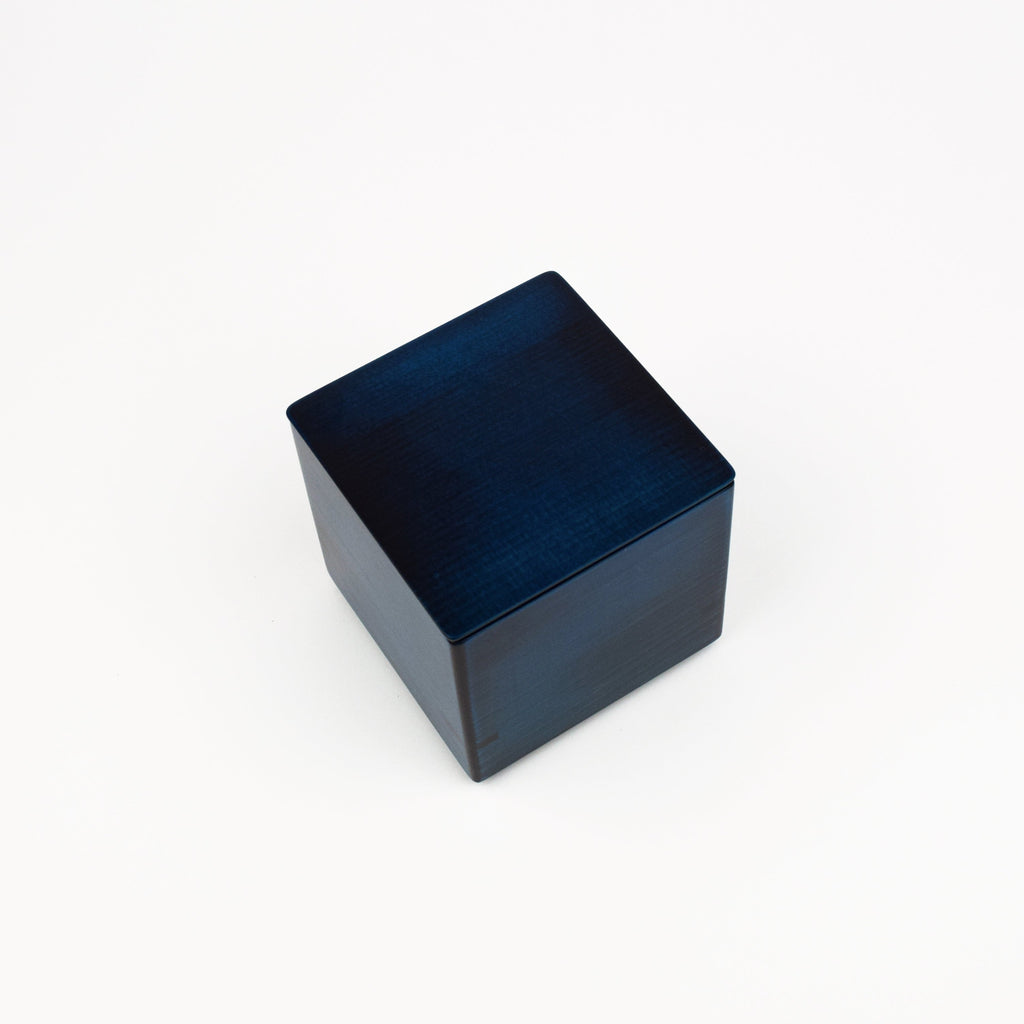 Blue square box with a lid on a white background