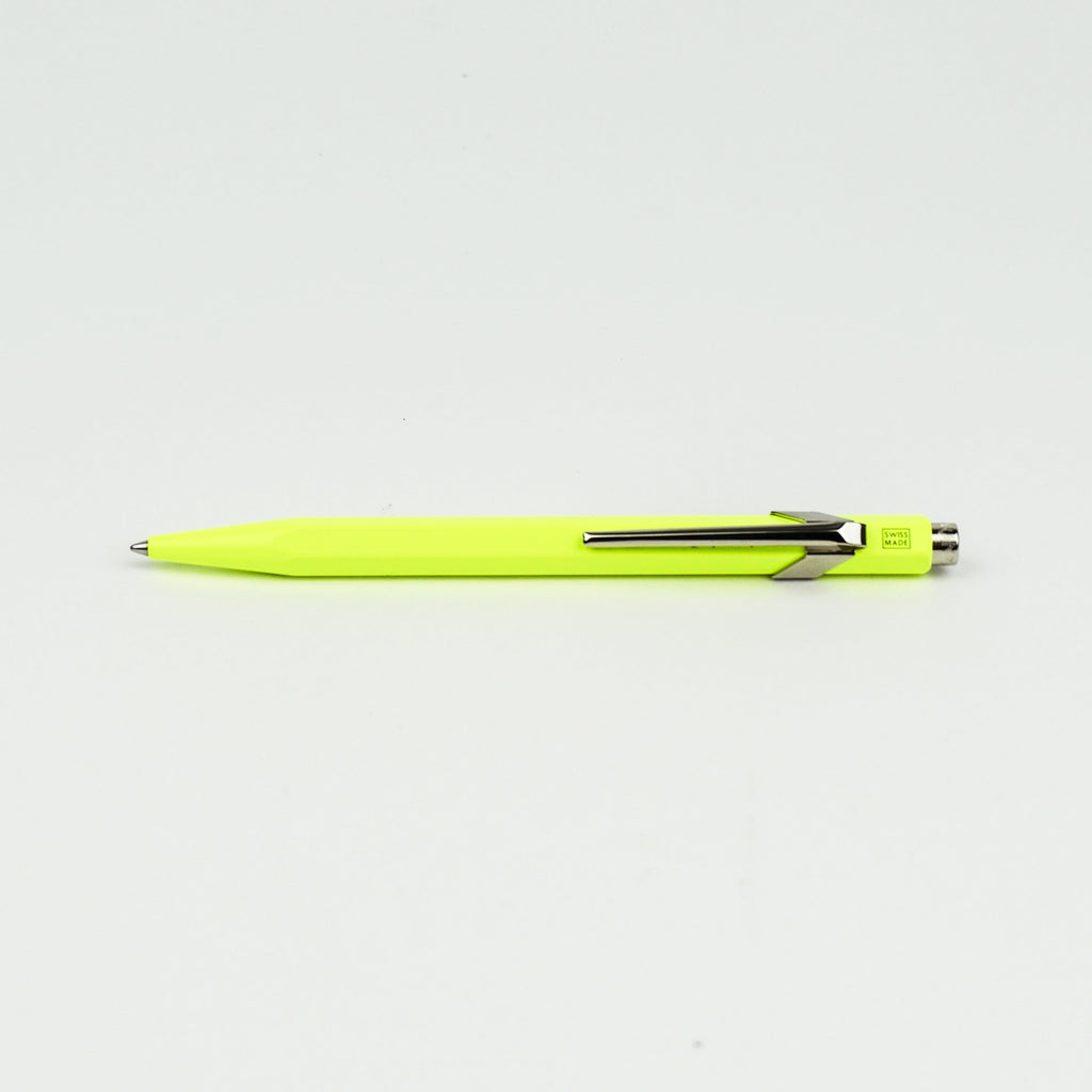 Neon yellow pen on a white background