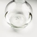 Clear glass object with a logo on a white background