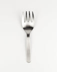Silver fork on a white background