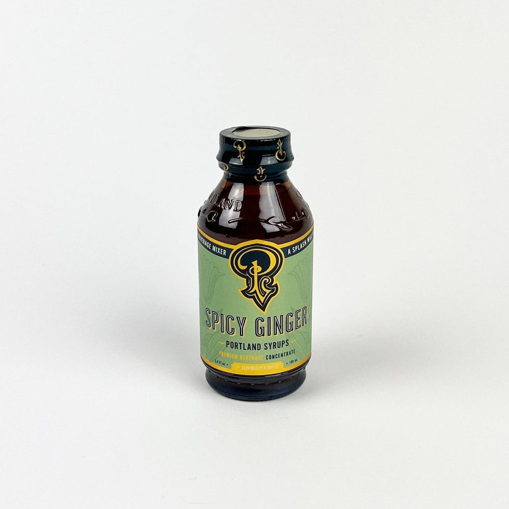 Bottle of spicy ginger on a white background