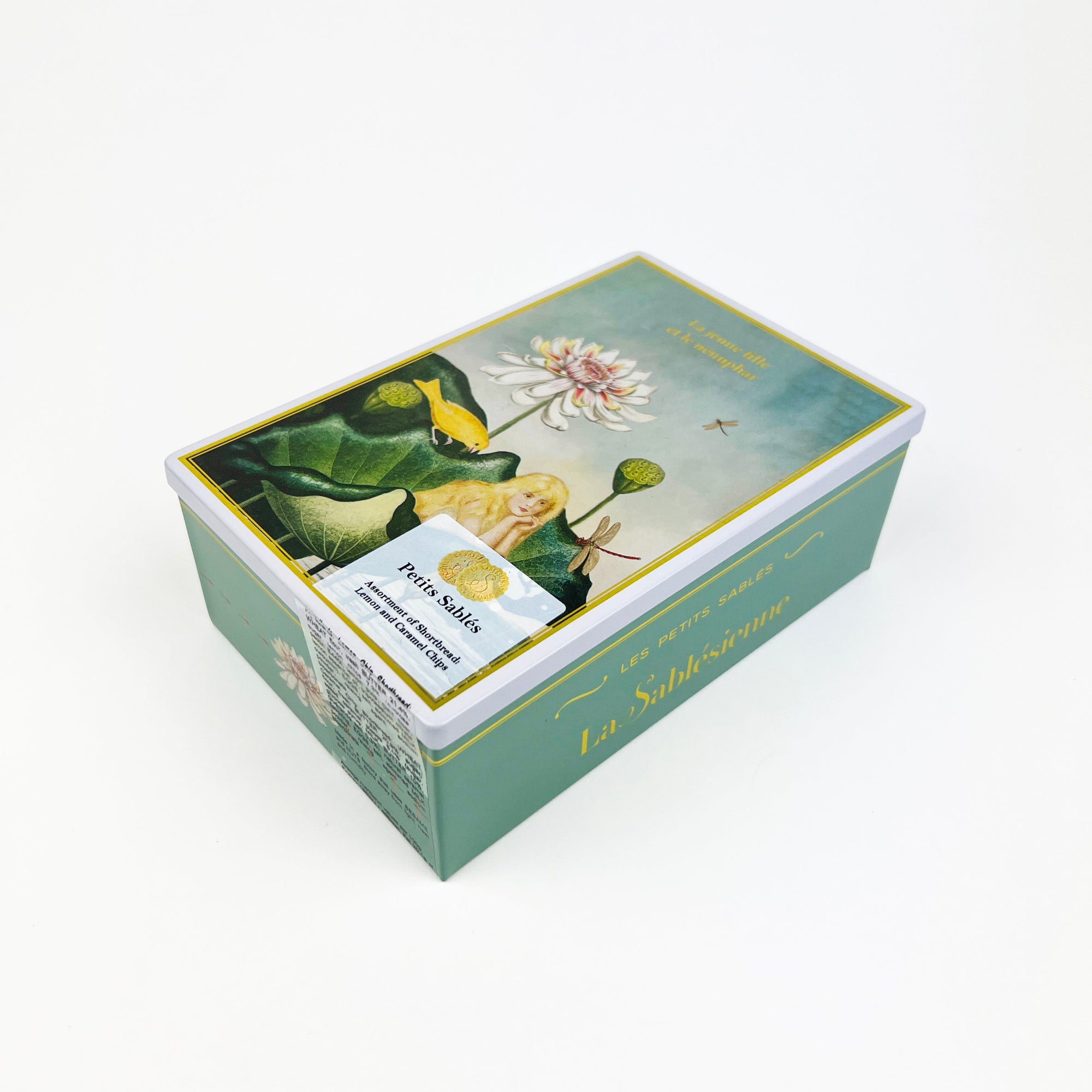 Shortbread tin with nature-themed design on a white background