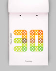 A minimalist desk calendar page showing the date March 30, 2027, as a large dotted number 30 on a white page, with 'Tuesday' printed below, set against a solid gray background.
