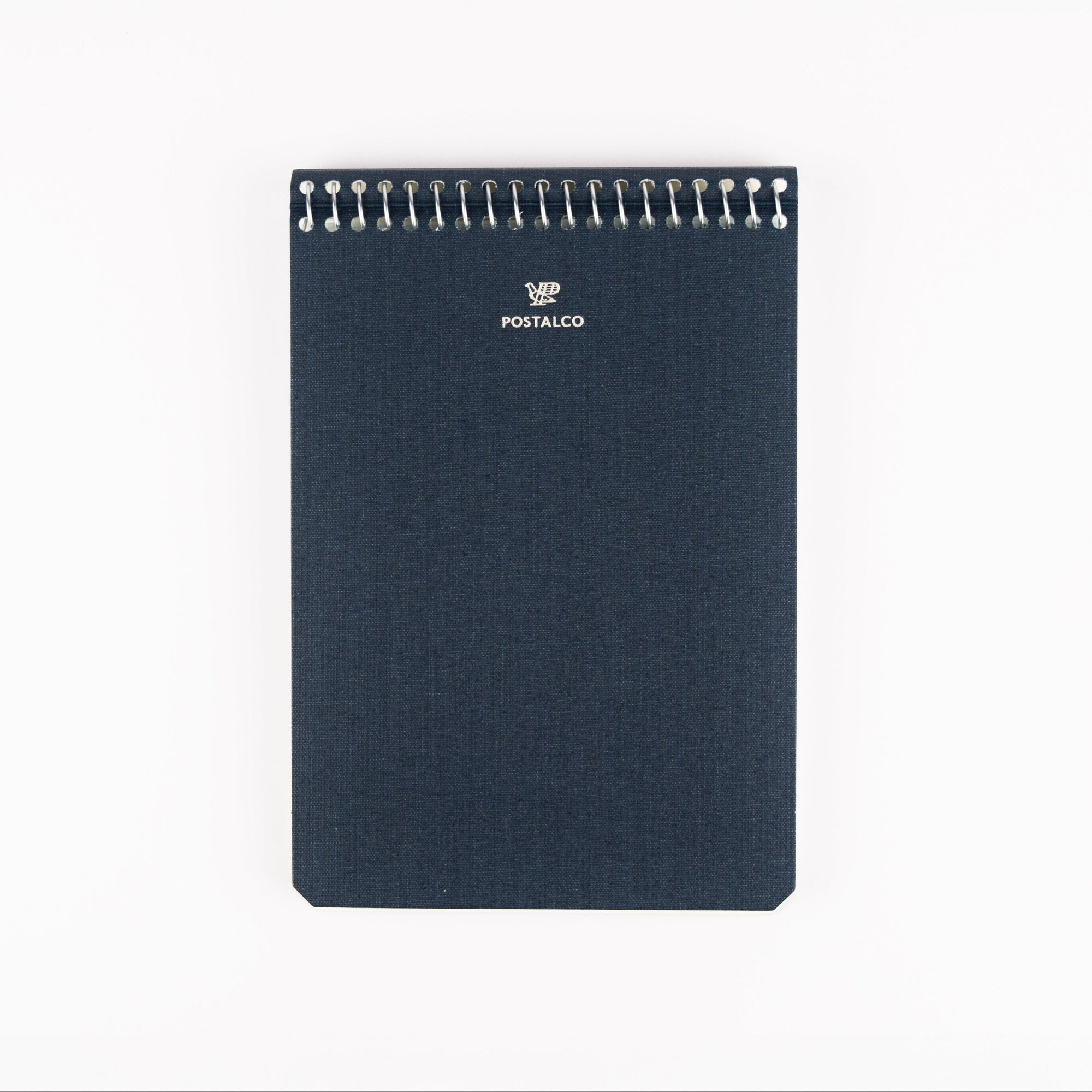 Dark blue notebook with spiral binding on a white background