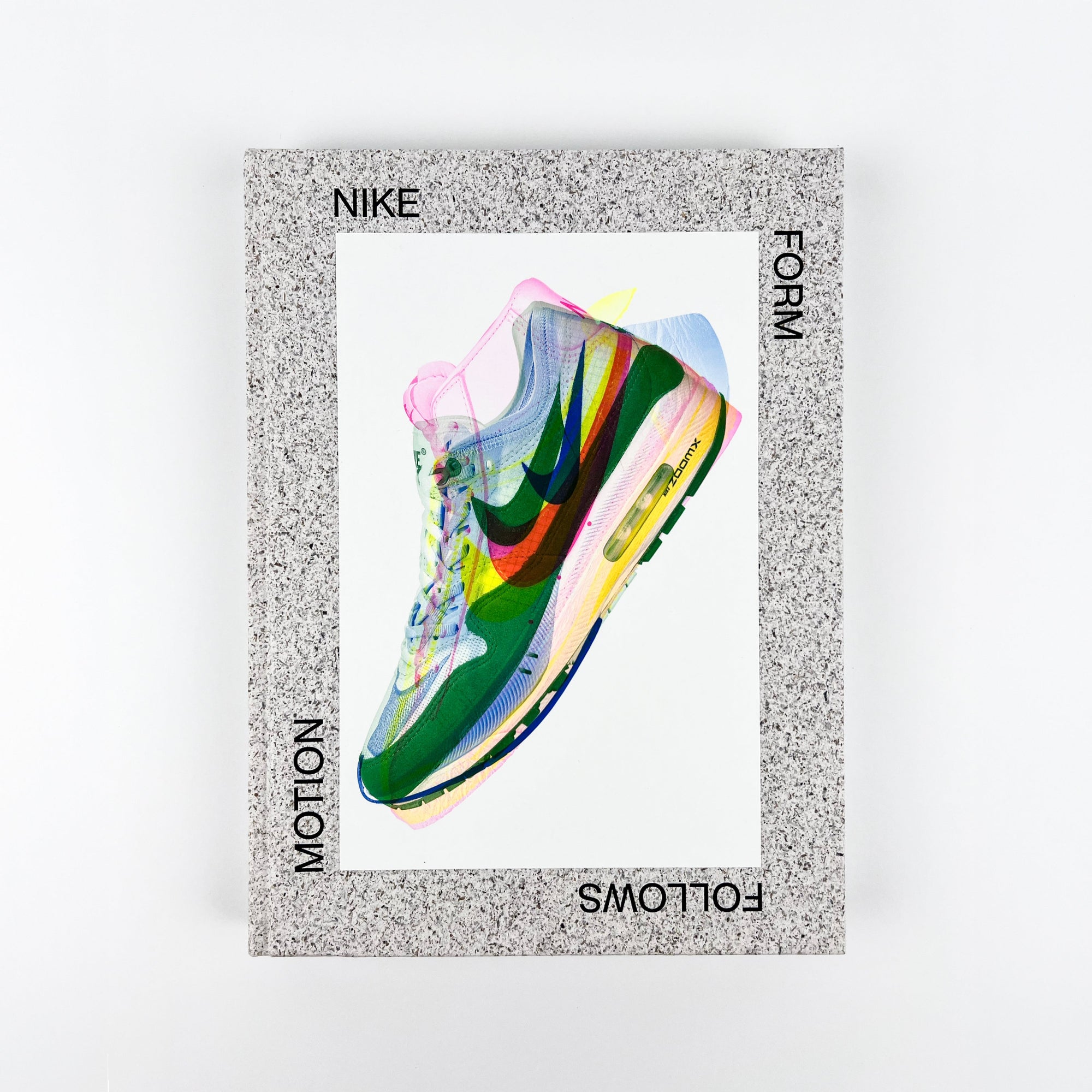 Book cover with colorful Nike sneaker on a white background with 'Nike' branding.