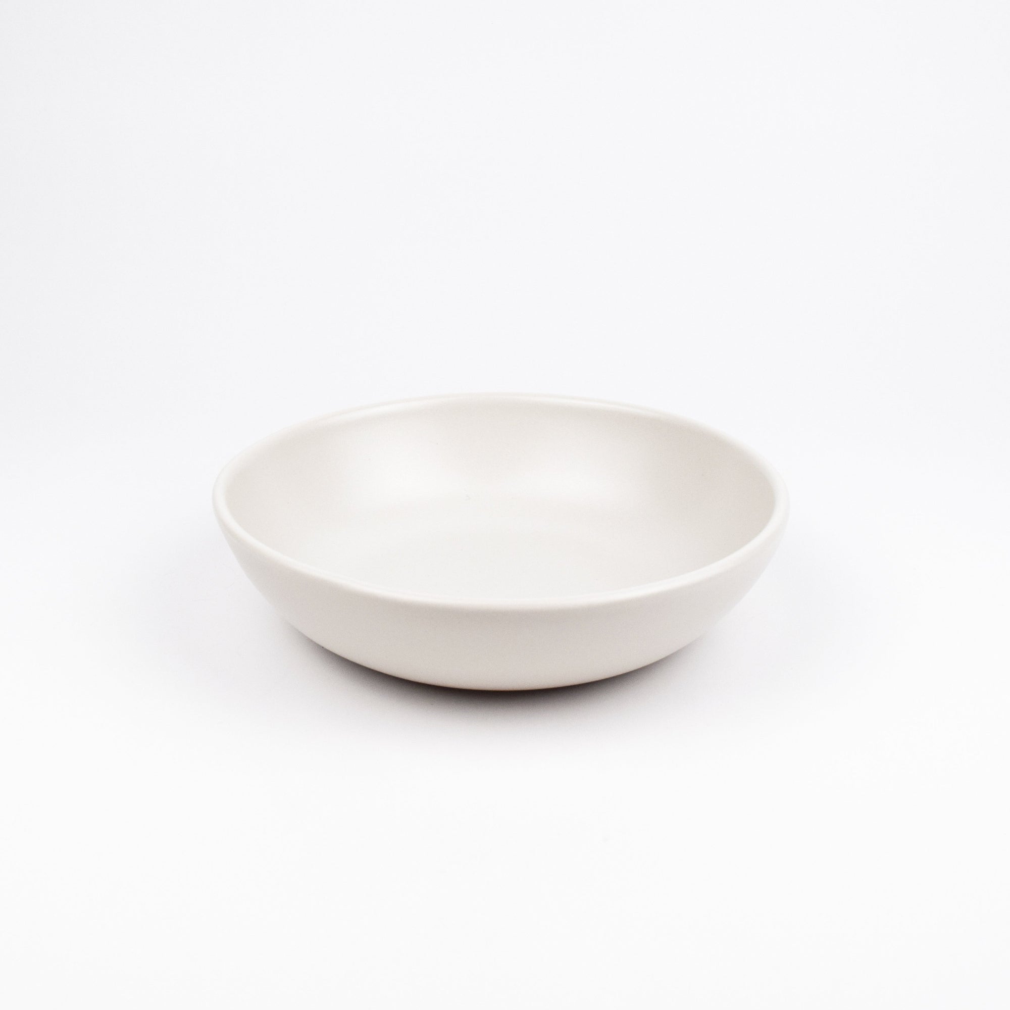 White ceramic bowl on a white background