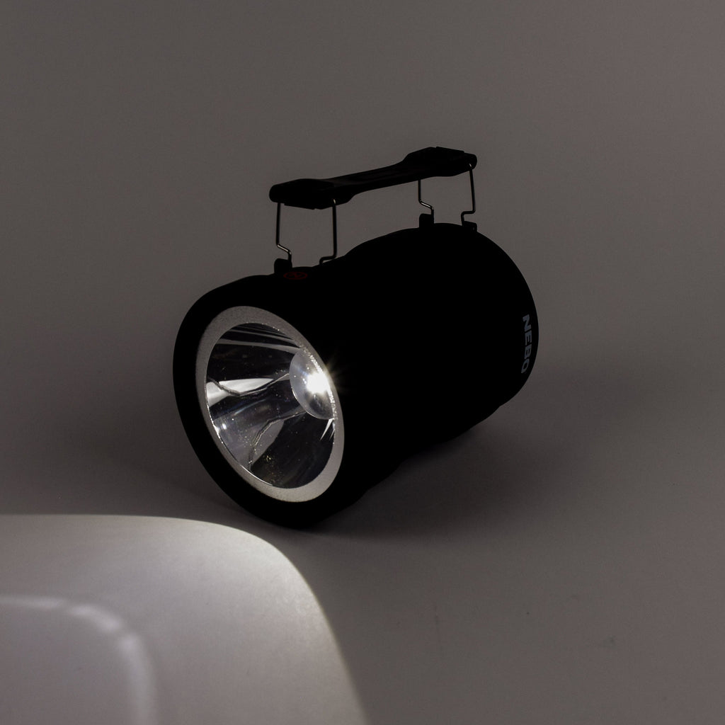 Black flashlight on a gray background