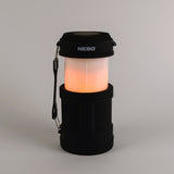 Nebo lantern with glowing interior on a gray background