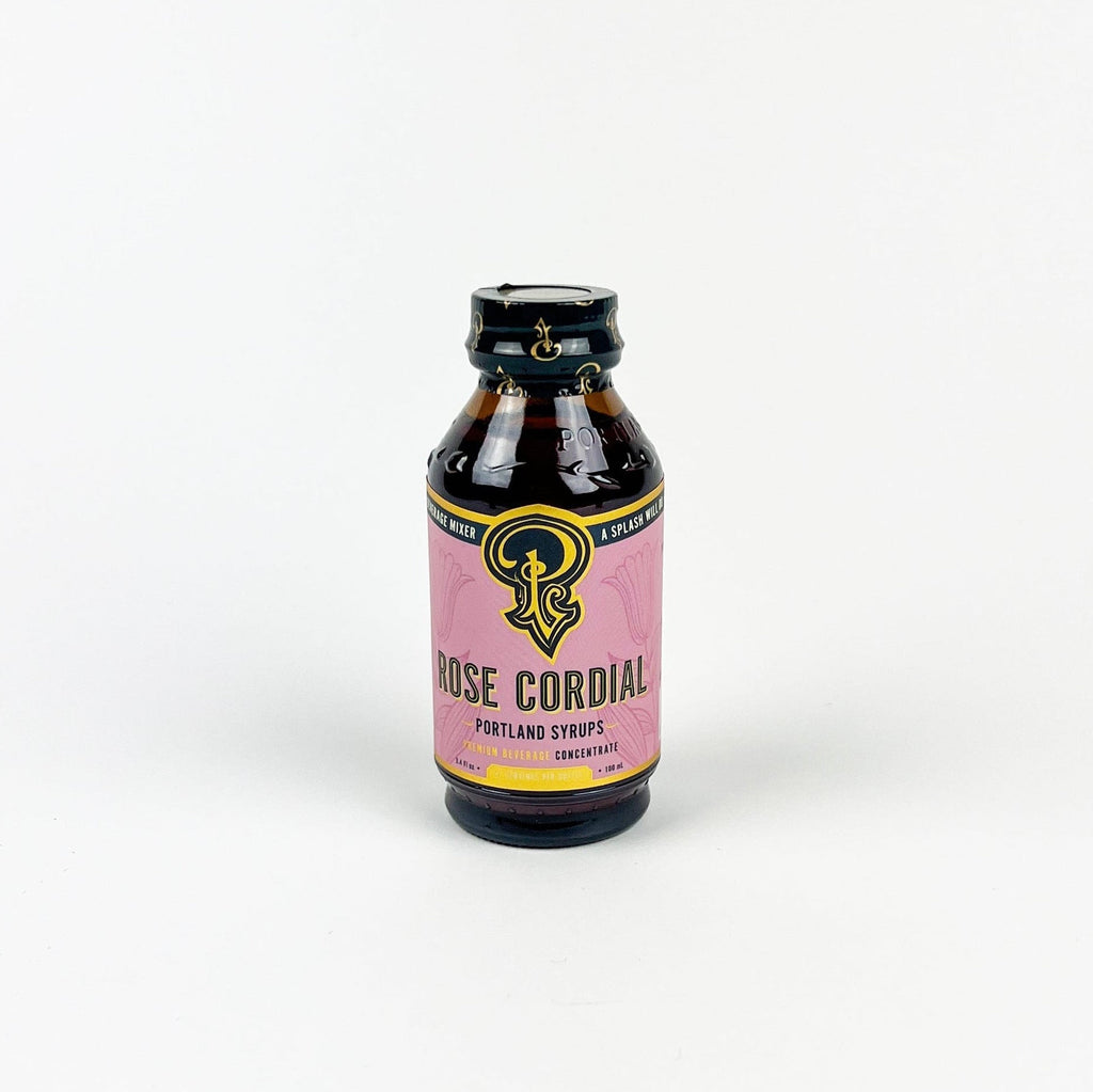 Bottle of Rose Cordial on a white background