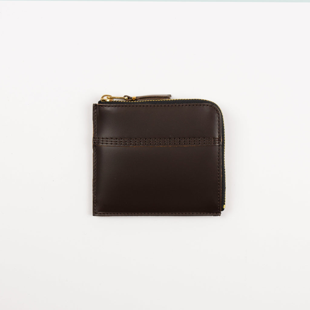 Brown leather wallet with a zipper on a white background