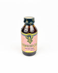 Bottle of strawberry lemonade syrup on a white background