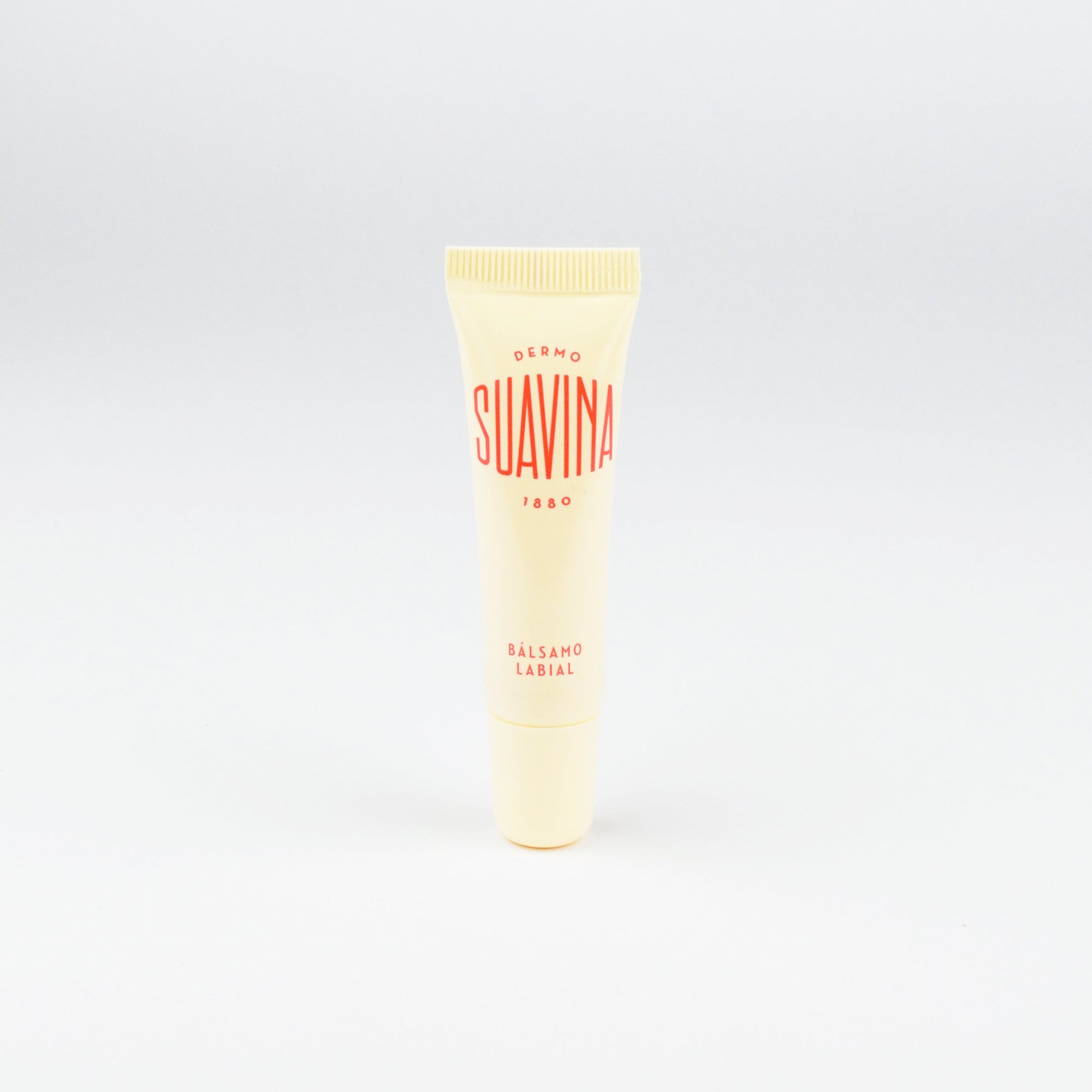 Tube of Suavina lip balm on a white background