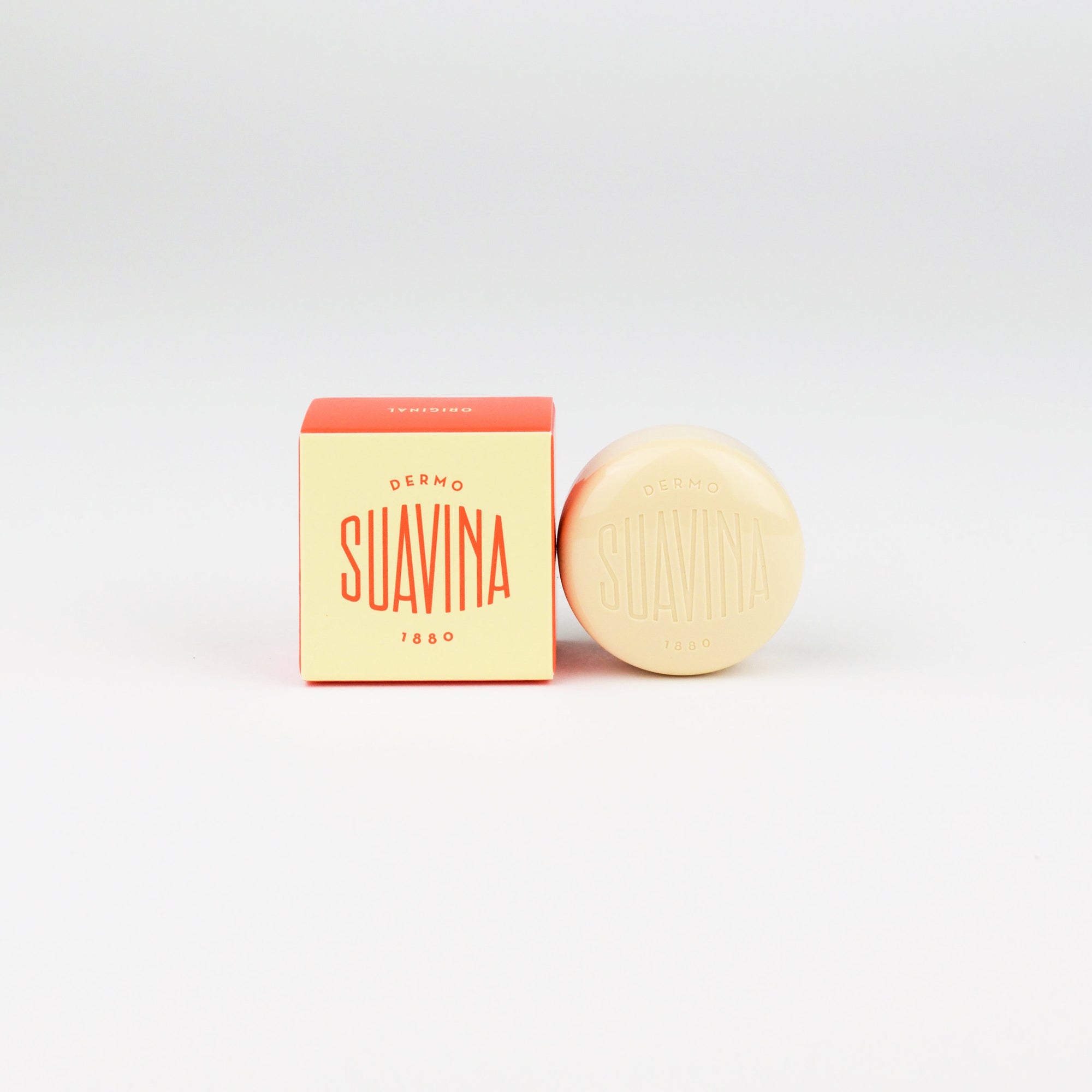 Suavina lip balm and packaging on a white background