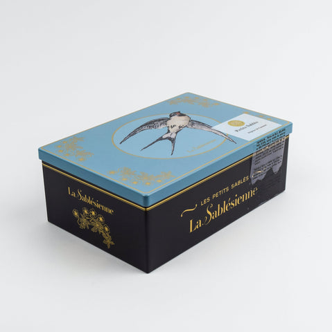 Decorative box with 'La Sabésienne' branding on a white background