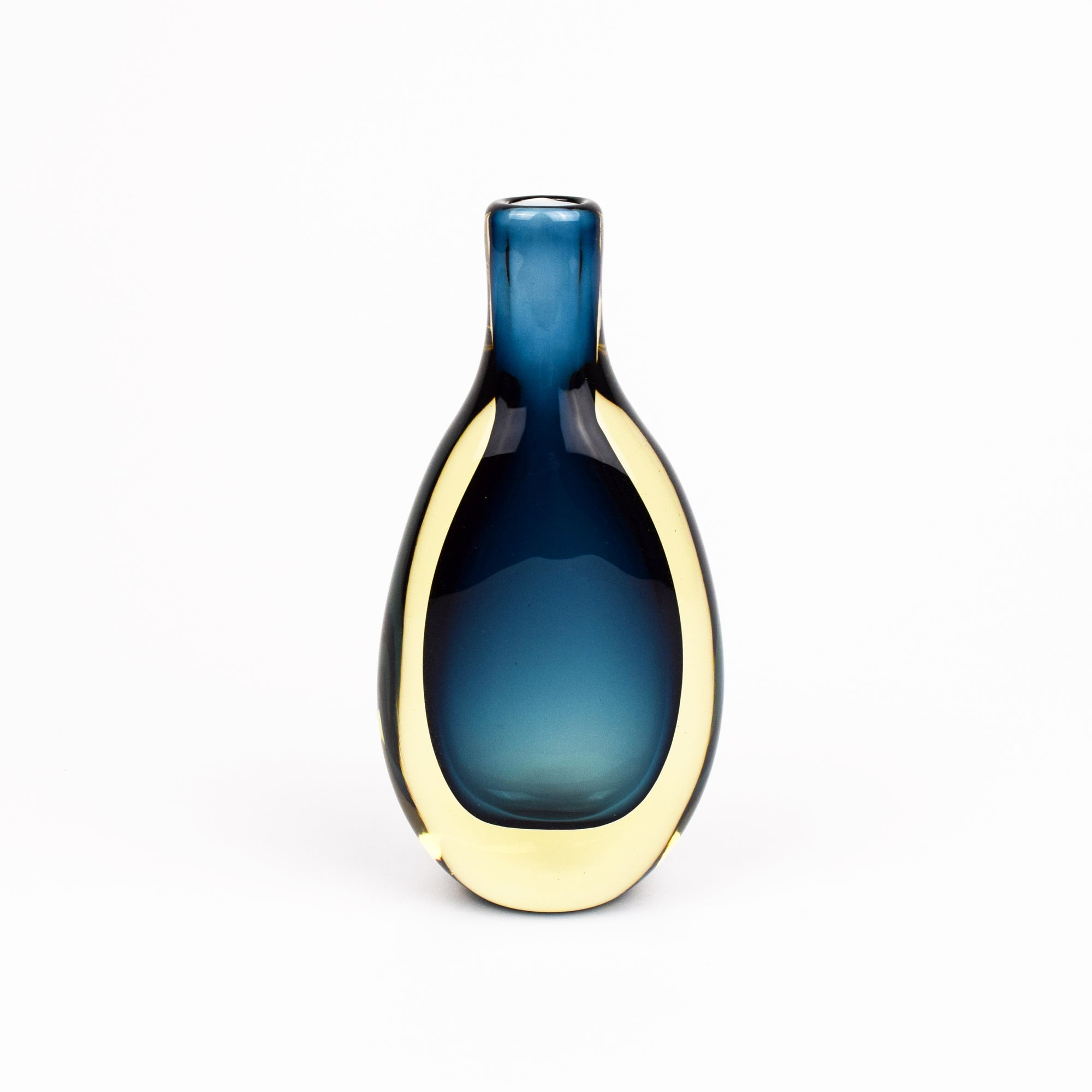 Blue glass vase with gold base on a white background