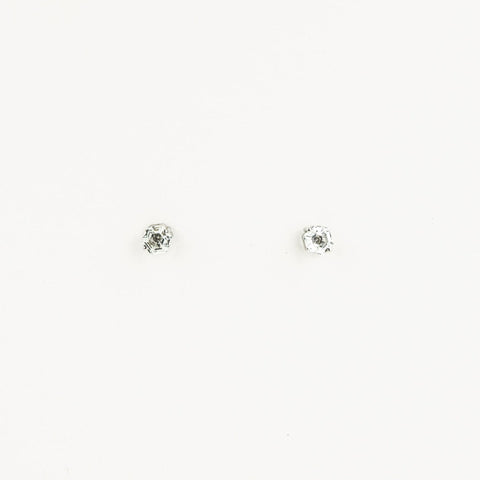 Pair of white sapphire earrings on a white background