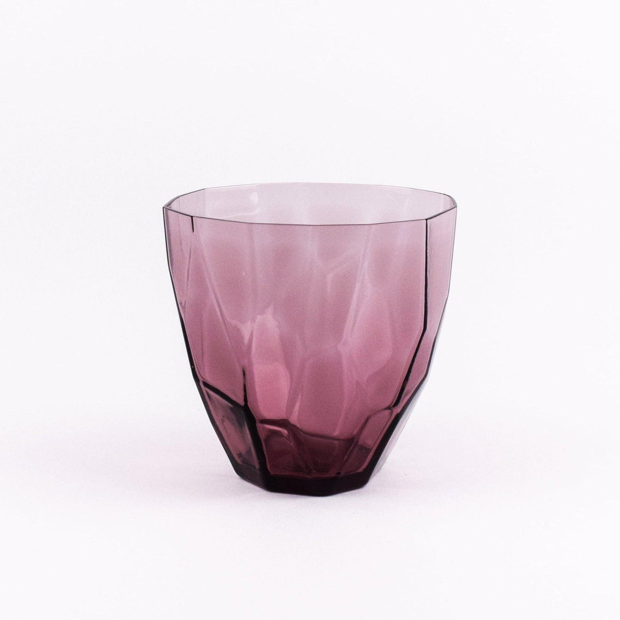 Wine red glass on a white background