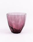 Wine red glass on a white background