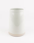White ceramic vase on a white background