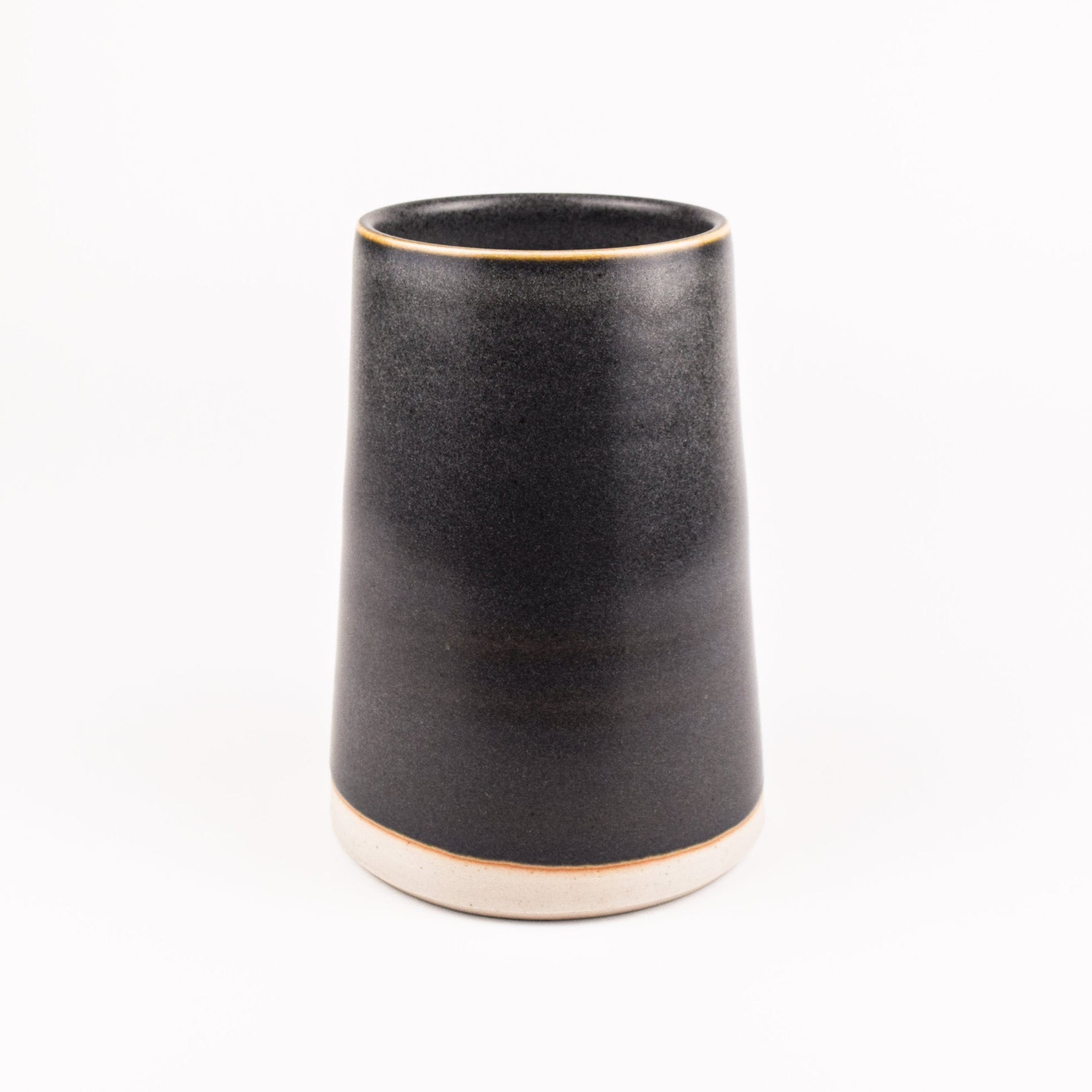 Charcoal glazed ceramic vase on a white background