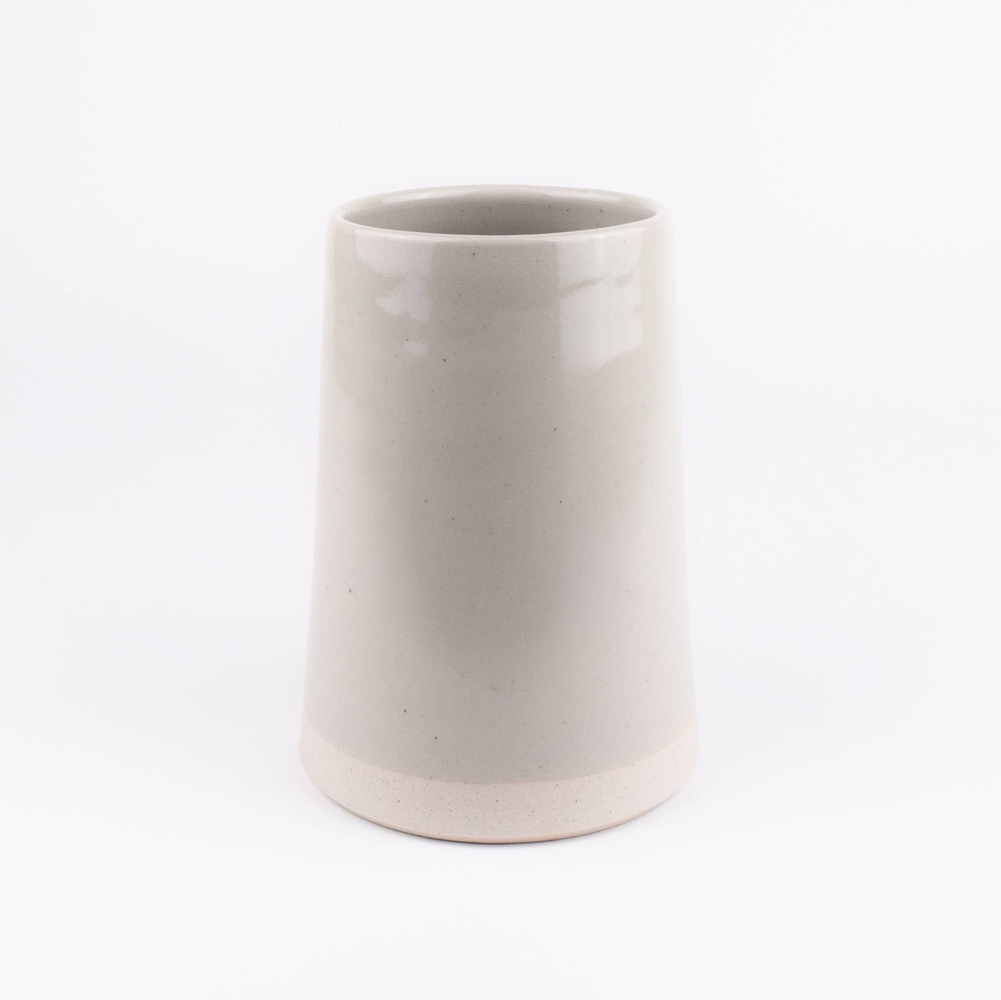 Pale grey ceramic vase on a white background