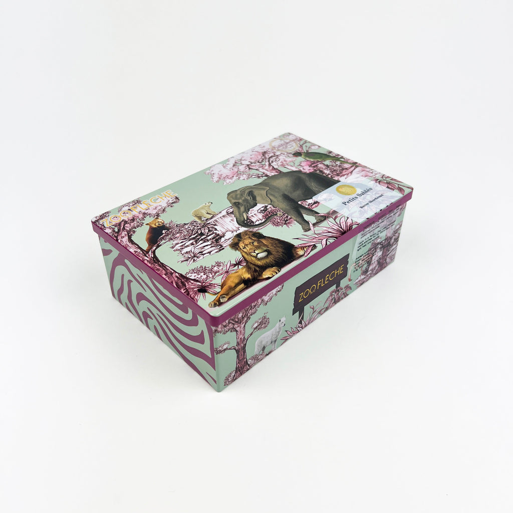 Decorative shortbread tin with illustrations of a zoo animals on a white background