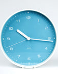 aira clock blue dial white metal case