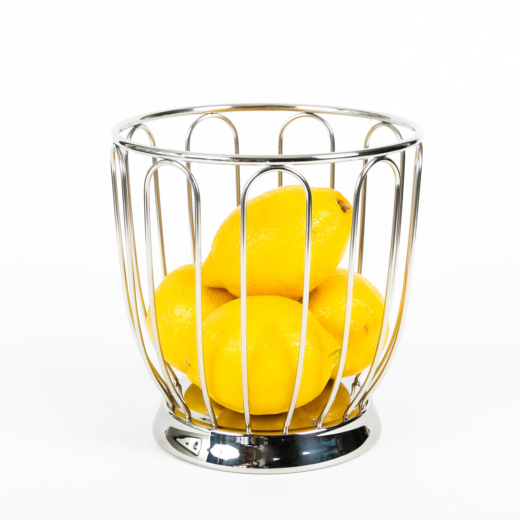alessi citrus basket in polished steel with lemons