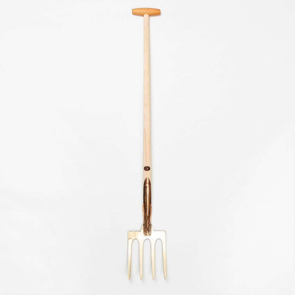 bronze gardening fork with long handle