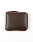 A brown leather wallet with a zipper closure and gold-toned metal hardware.