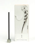 A box of Elemense incense with a single incense stick placed in front, against a white background with a minimalist design.